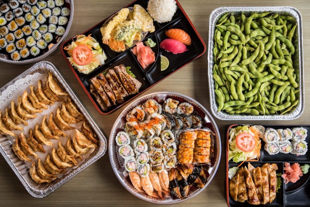 asian food catering including sushi, edamame, and potstickers